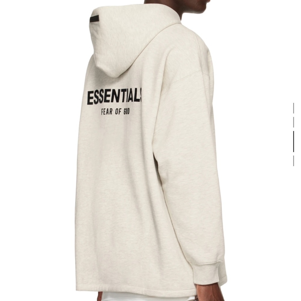 New. Never worn before. Essentials cream sweatshirt.